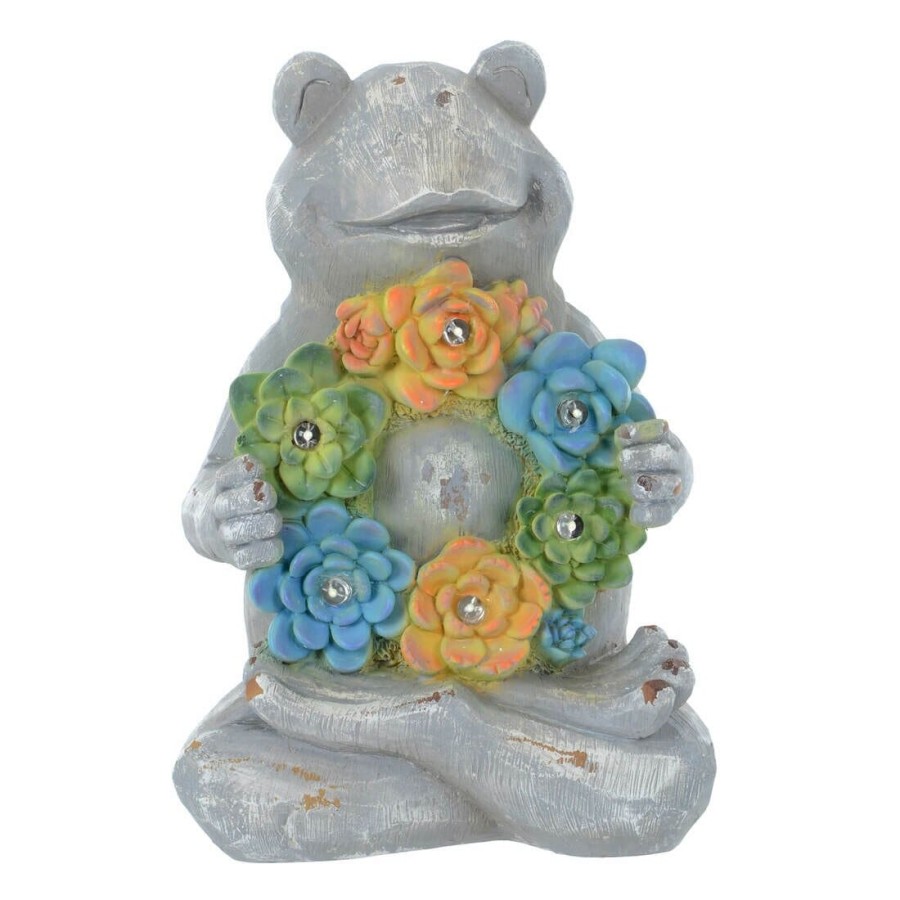 Click to view product details and reviews for Solar Garden Ornament With Flower Garland 6 White Led Lights Frog.