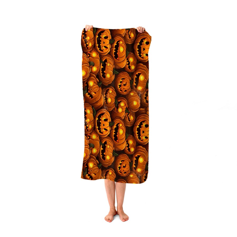 Click to view product details and reviews for Grinning Lanterns Pumpkins Beach Towel.
