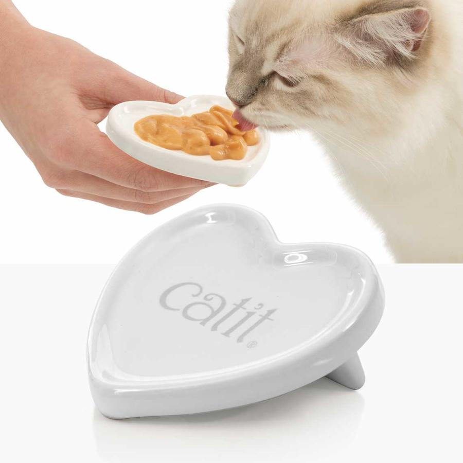 Click to view product details and reviews for Catit Creamy Heart Shaped Treat Dish.