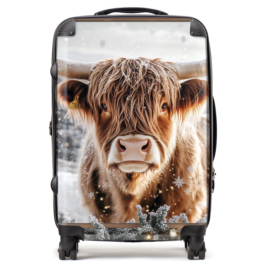 Click to view product details and reviews for Wintery Highland Cow Suitcase Medium.