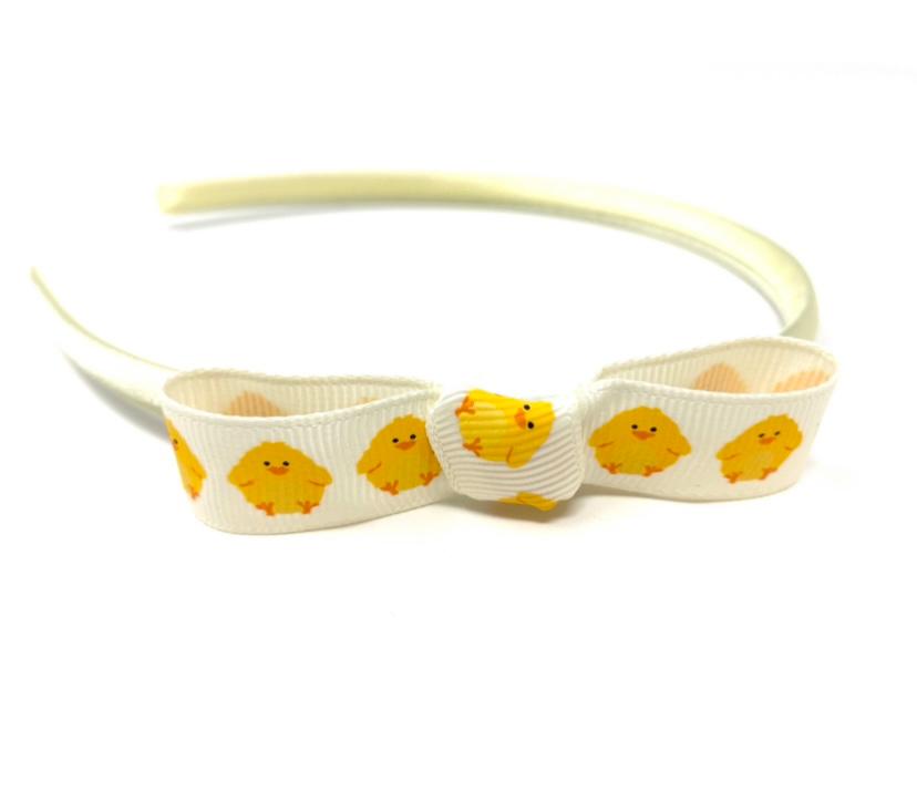 Click to view product details and reviews for Cute Chick Bow Headband.