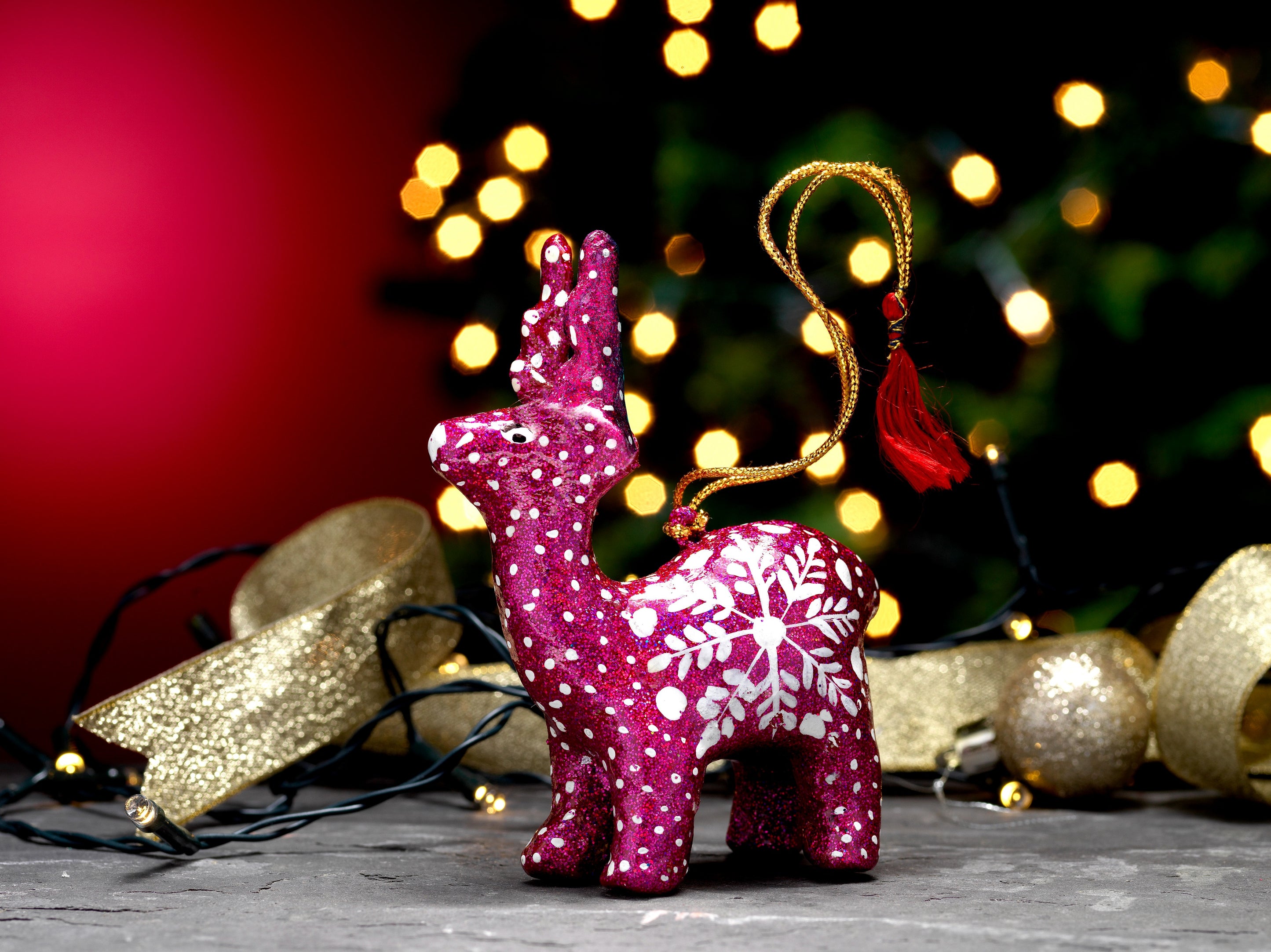 Click to view product details and reviews for Hanging Handmade Christmas Reindeer Decoration Pink.