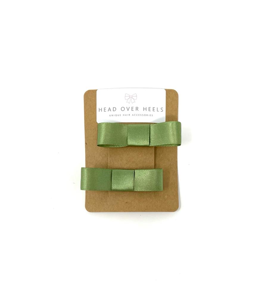 Click to view product details and reviews for Sage Green Bow Hair Clip Set.