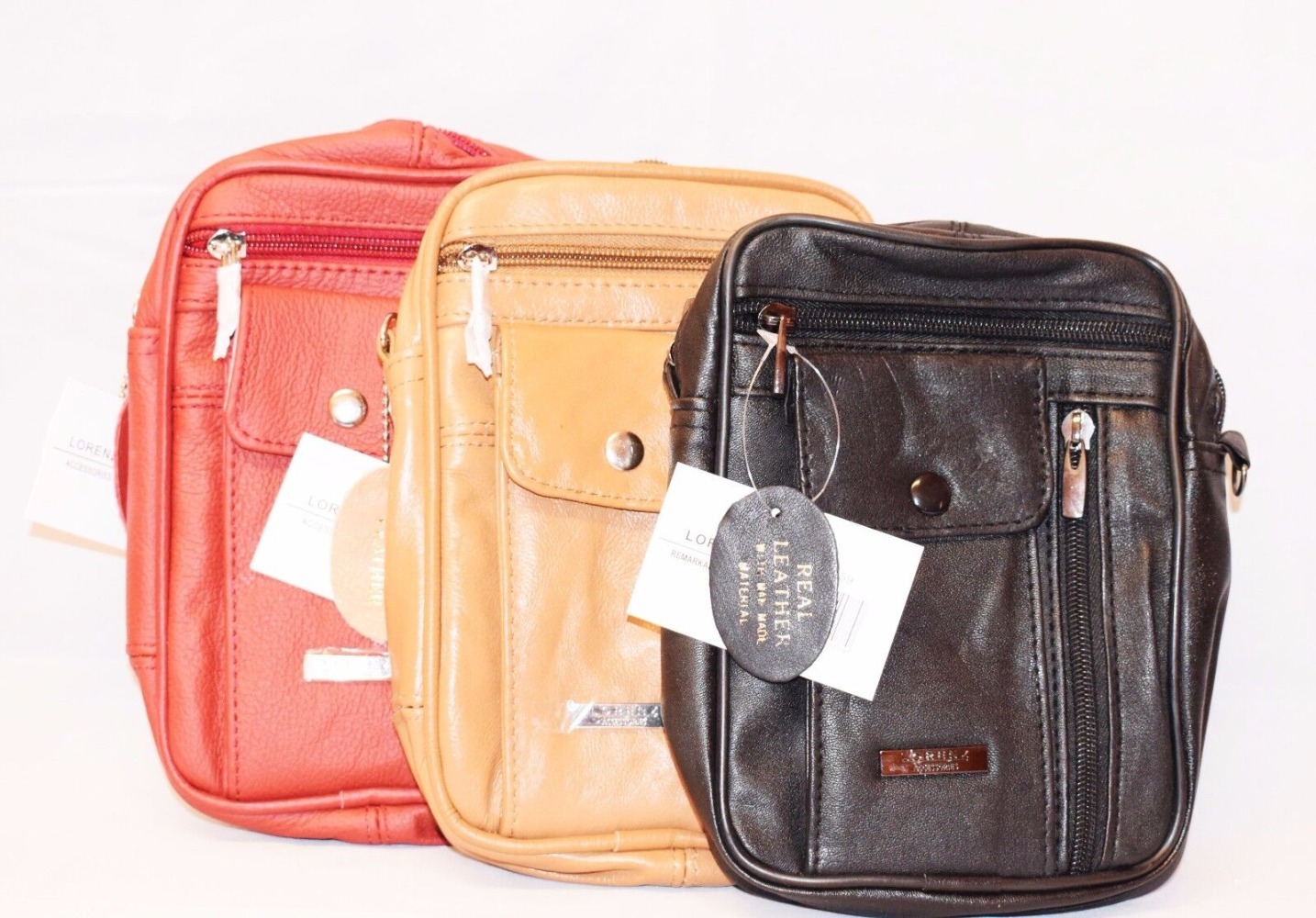 Click to view product details and reviews for Unisex Genuine Leather Multi Zipped And Glasses Mobile Pocket Crossbody Bag.